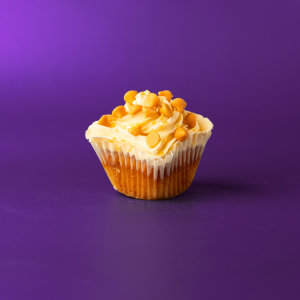A butterscotch cupcake topped with butterscotch cream cheese, finished with a butterscotch drizzle and butterscotch chips. Butterscotch Beer cupcake