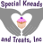 two hands in the shape of a heart with a cupcake in the middle