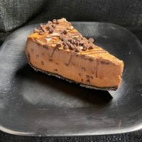 Chocolate drizzle, chocolate chips, chocolate crust, chocolate cheesecake, chocolate lovers' delight. Death by Chocolate