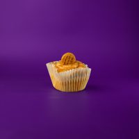 A peanut butter cupcake topped with peanut butter marshmallow fluff buttercream, a mini Nutter Butter cookie, and peanut butter drizzle. Fluffer Nutter cupcake