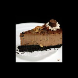Chocolate, caramel, and pecan cheesecake topped with, you guessed it, chocolate, caramel, and pecans. Turtle
