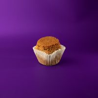 An oatmeal cupcake, split in two, filled with oatmeal pie filling. Oatmeal Pie cupcake
