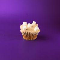 A hot chocolate cupcake topped with a hot chocolate whipped cream icing and finished off with mini marshmallows. Hot Chocolate cupcake