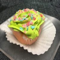 A Jolly Rancher cupcake with a Jolly Rancher cream cheese icing and sprinkled with chopped jolly ranchers. Jolly Rancher