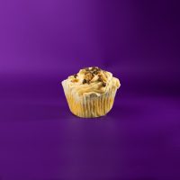 A butter pecan cupcake with chocolate chips and pecans with a pecan pie filling and brown sugar cream cheese icing, topped with chocolate chips and pecans. Derby Pie cupcake