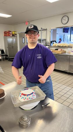 Philip A staff member and his decorated cake