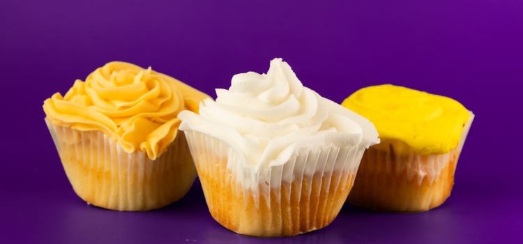 A set of three vegan cupcakes, all vanilla with the three different icings; caramel, vanilla, and lemon 3 Vegan cupcakes
